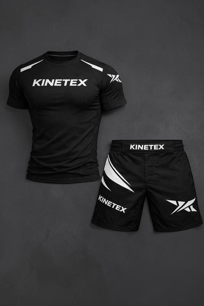 Kinetex black MMA combat pro set with compression rash guard and shorts featuring white Kinetex branding and graphic accents.