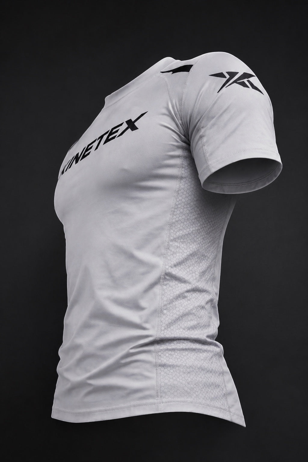 Kinetex Combat Pro Rash Guard in light grey, short-sleeved, with compression fit and hexagonal side panels.