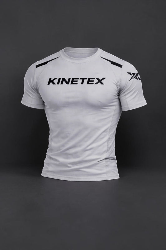 Kinetex Combat Pro short-sleeve white rash guard with black Kinetex logo on chest and graphic on sleeve.
