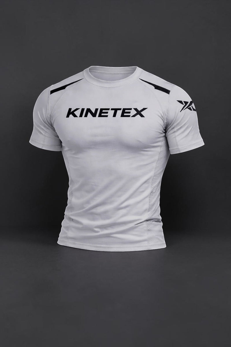 Kinetex Combat Pro short-sleeve white rash guard with black Kinetex logo on chest and graphic on sleeve.
