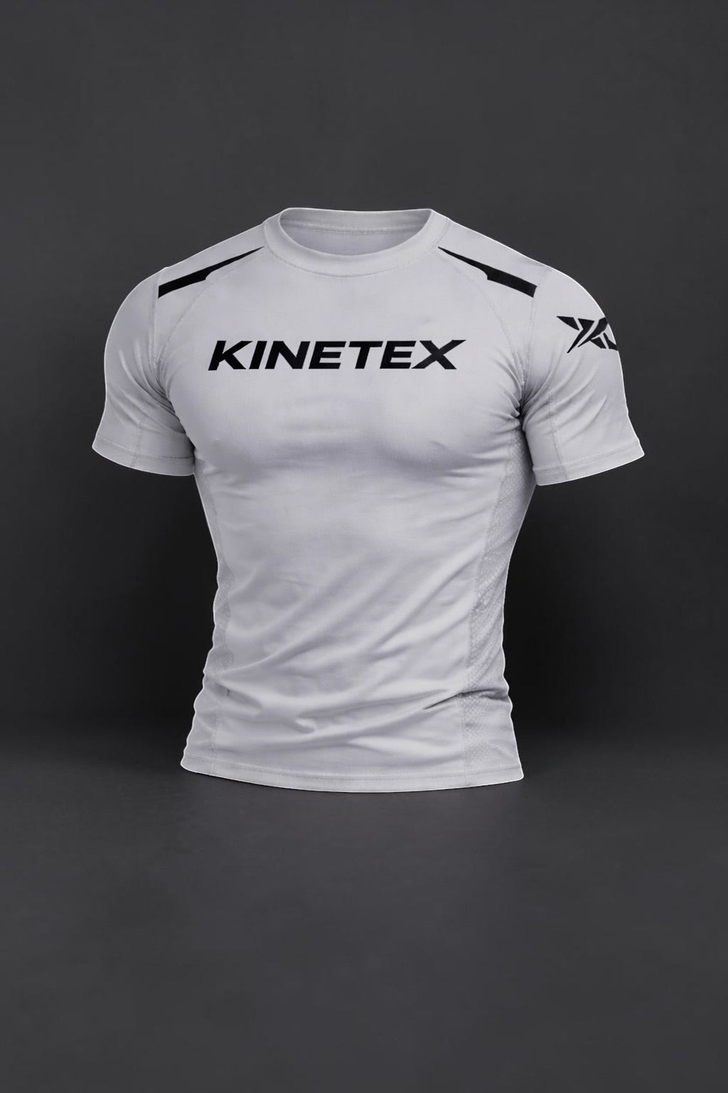 Kinetex KX Combat Pro MMA set: white short-sleeve compression rash guard with black Kinetex logo and accents.